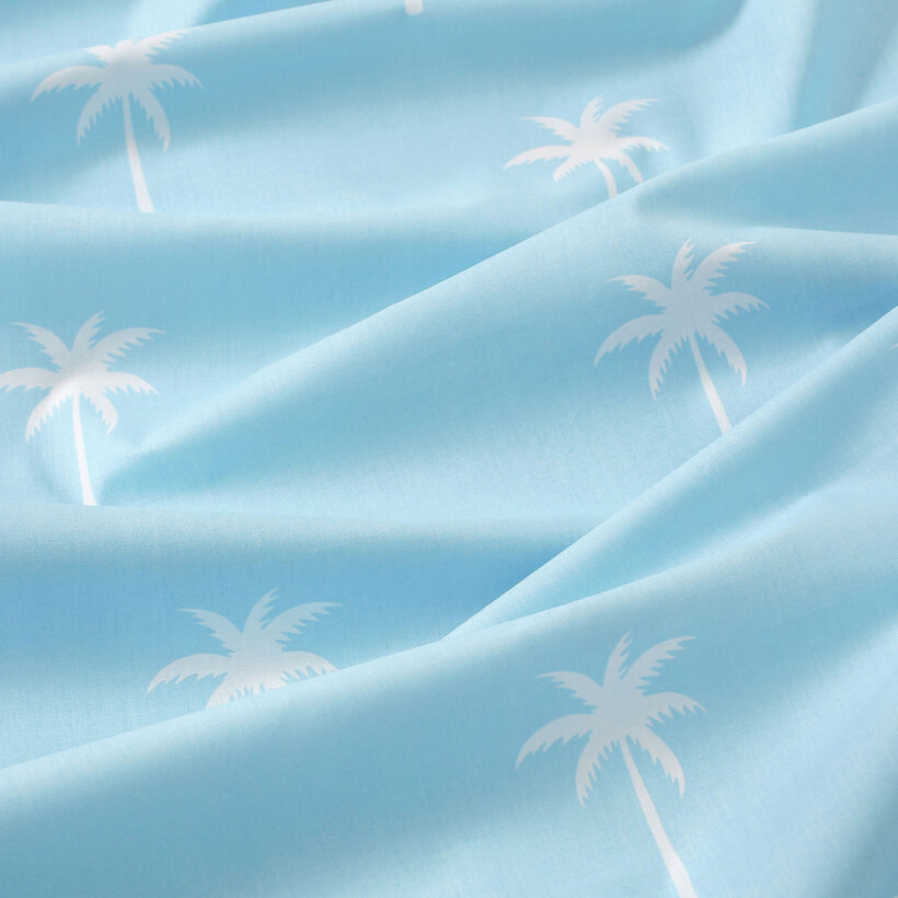Katoenen kussensloop - Palmen op pastelblauw