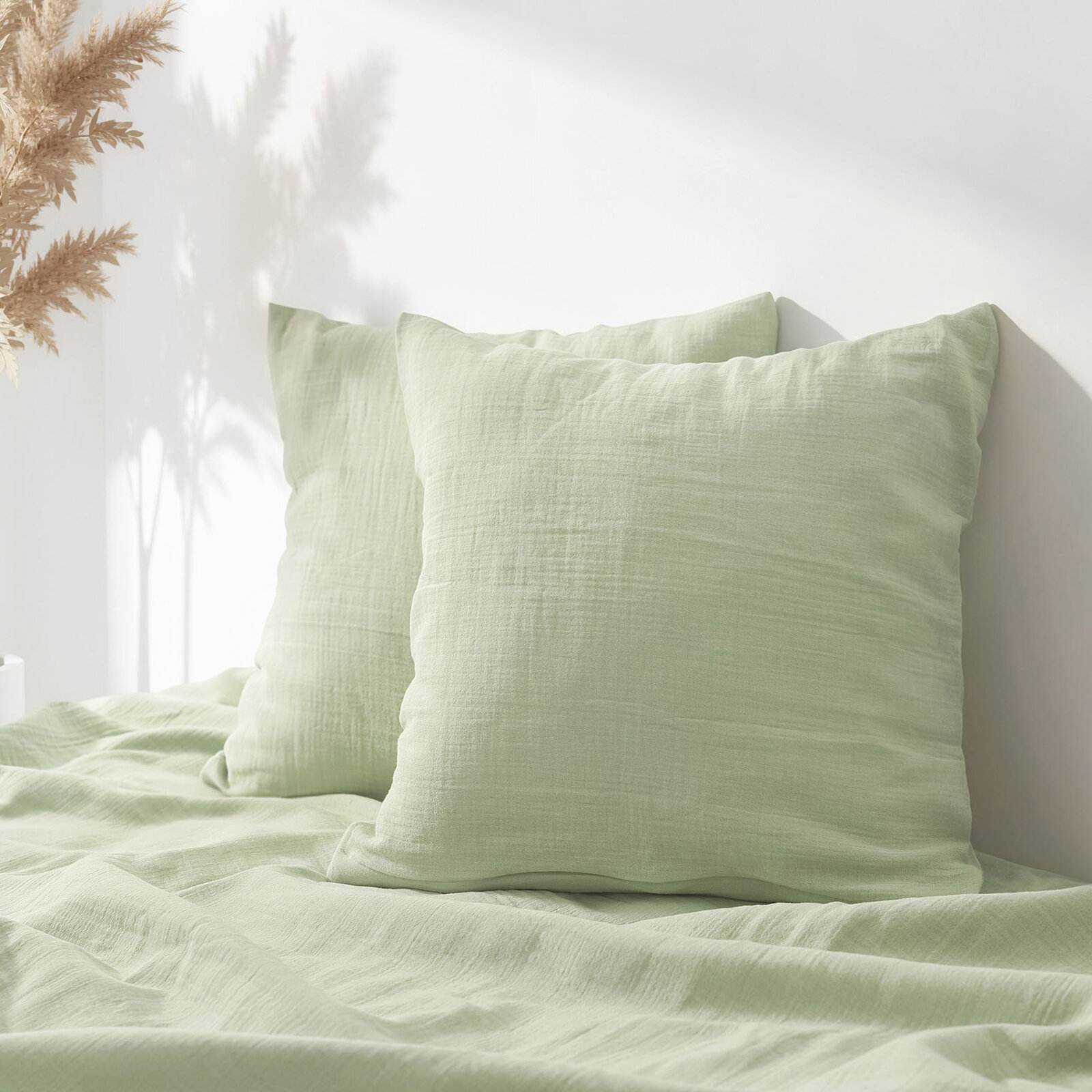 Mousseline kussensloop - licht saliegroen