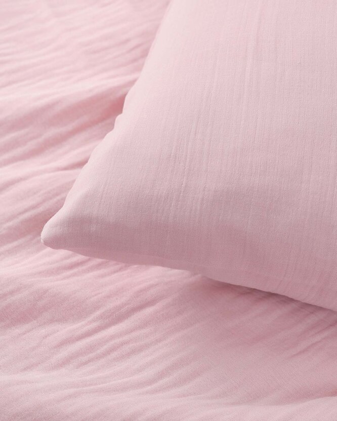 Mousseline kussensloop - pastelroze