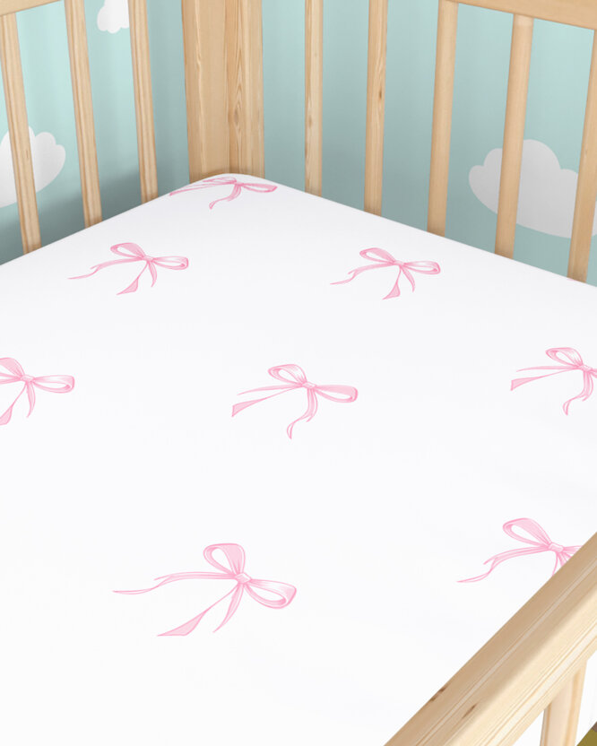 Katoenen hoeslaken voor het babybedje - Roze strikjes