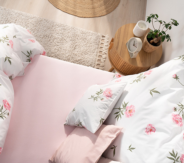 Hoe kies je het juiste laken voor een tweepersoonsbed?