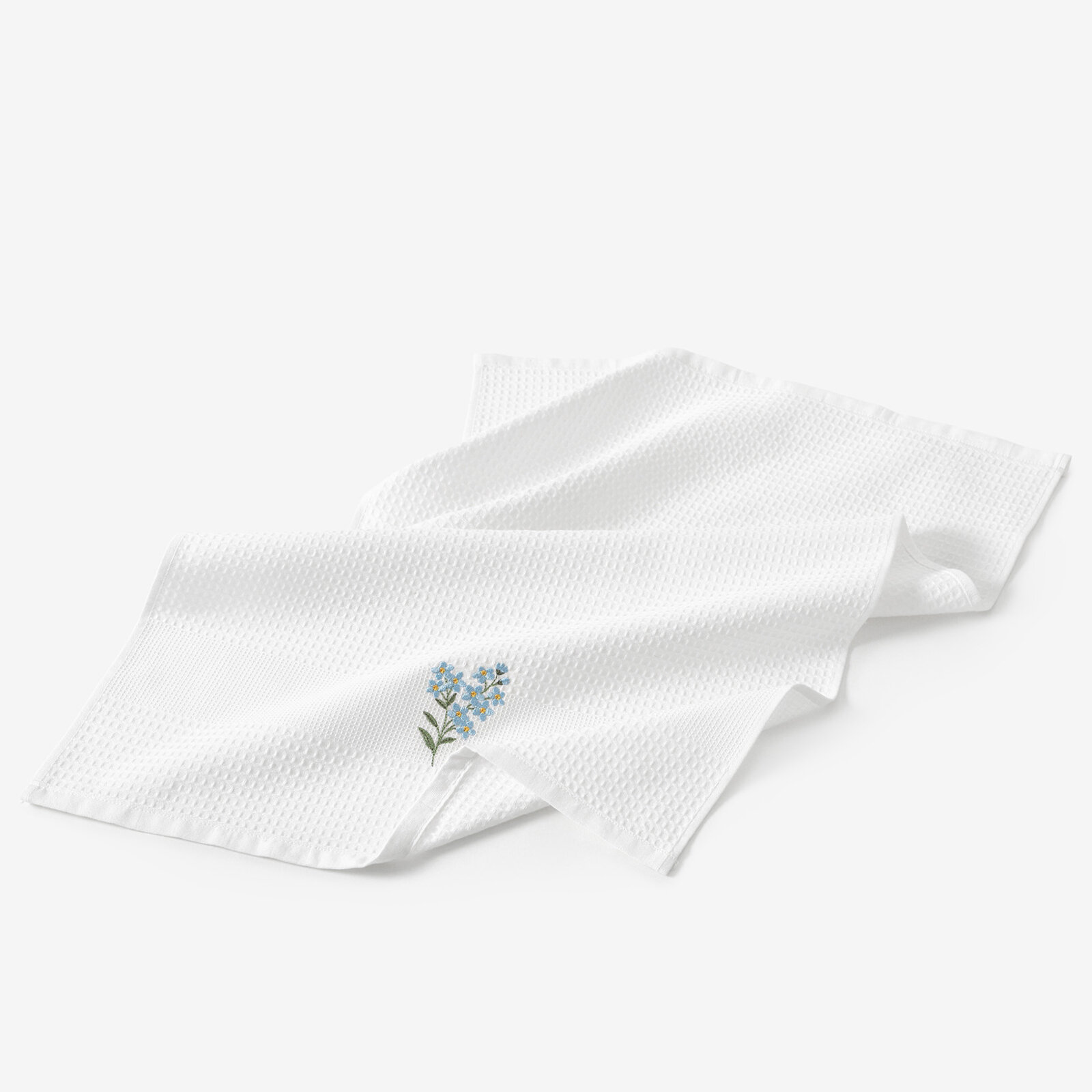 Geborduurde theedoek (wafeldoek) - Vergeet-mij-nietjes op wit