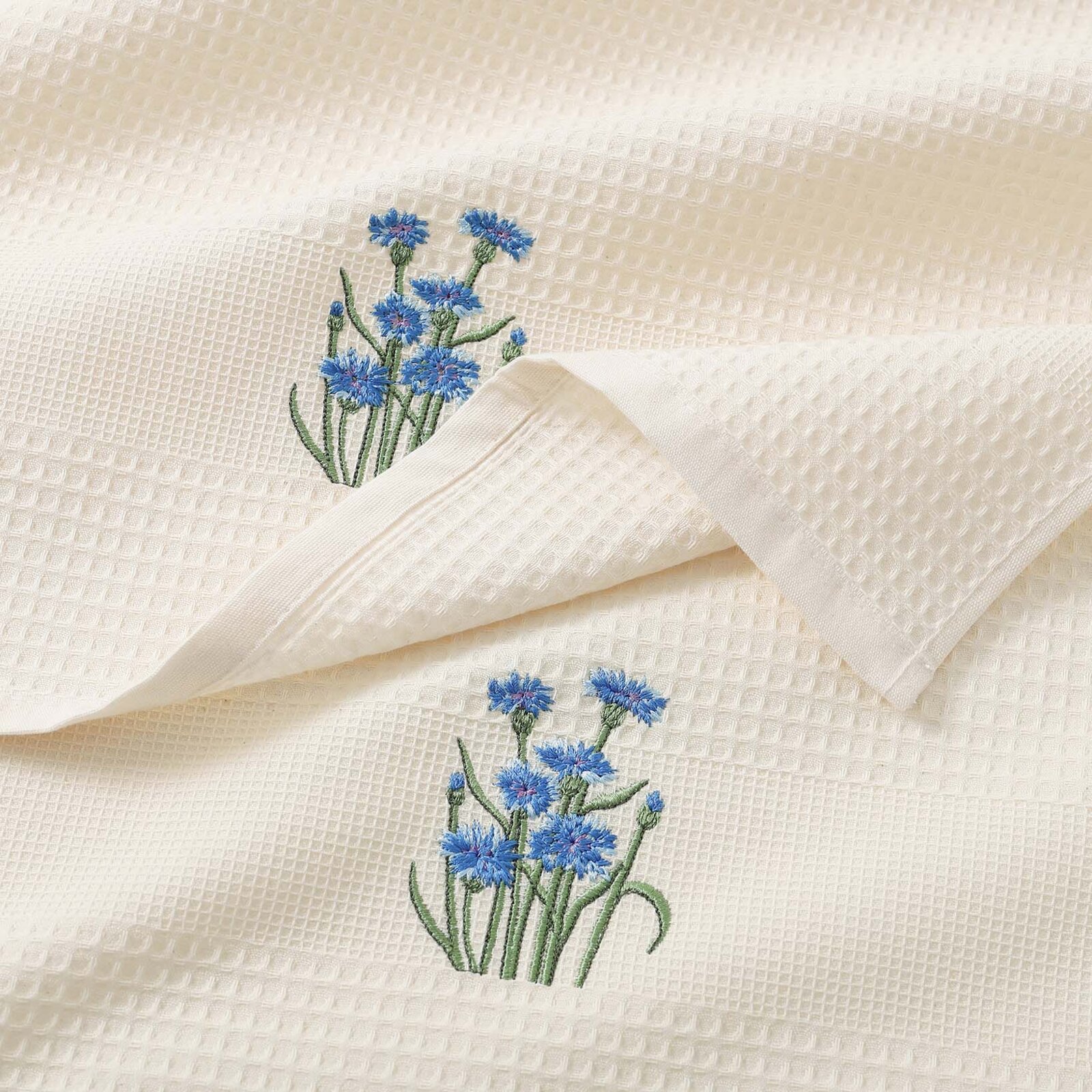 Geborduurde theedoek met wafelstructuur - Korenbloemen op crème