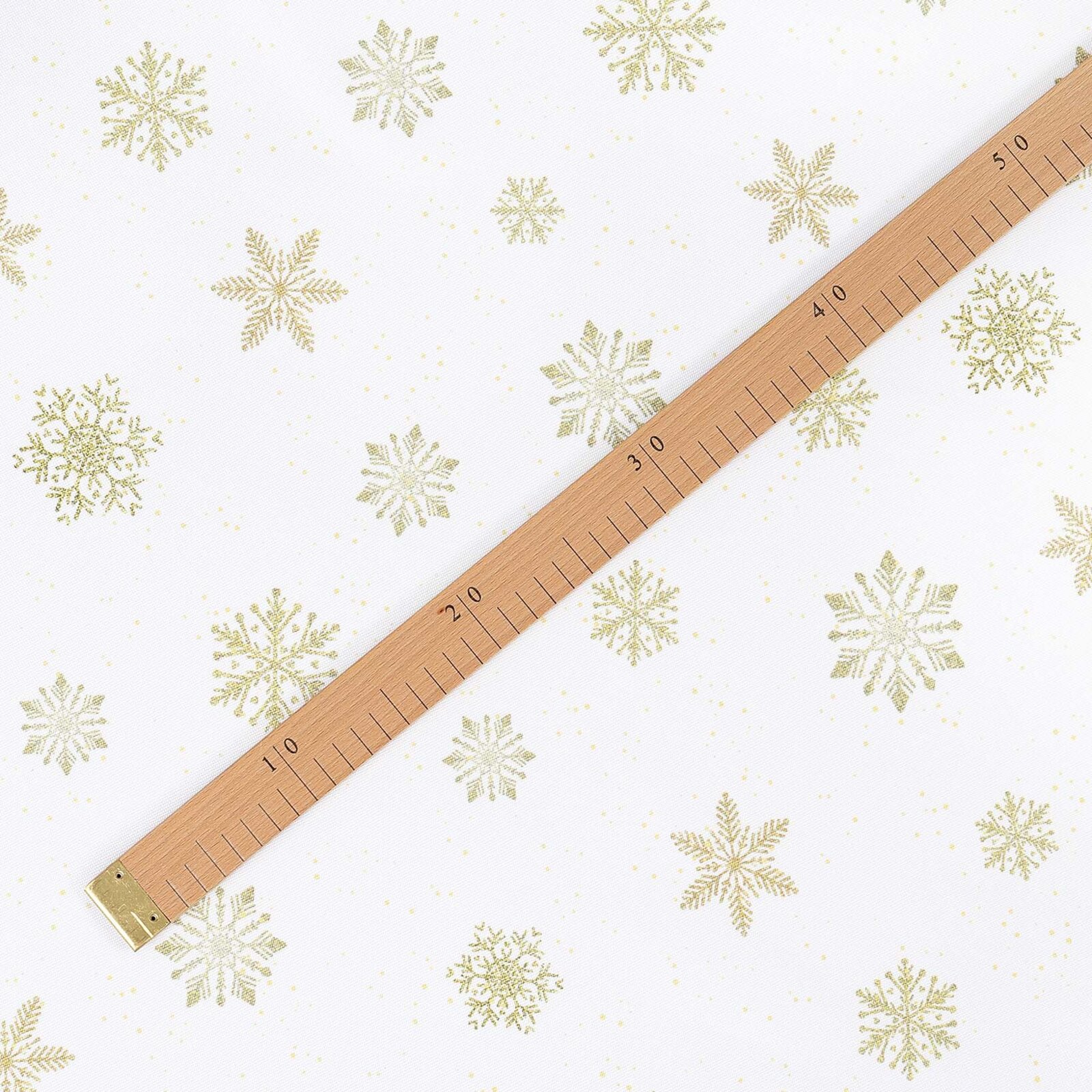 Tafelstof met tefloncoating - Gouden sneeuwvlokken