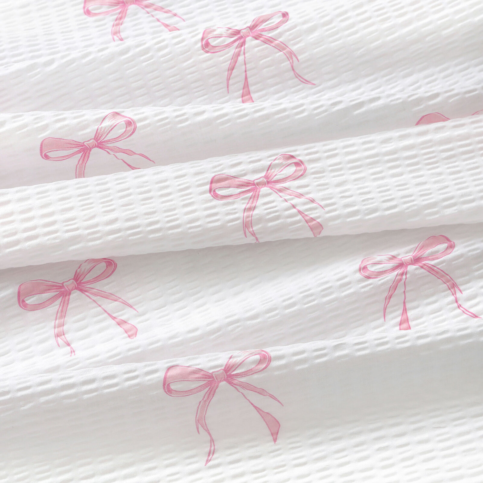 Katoenen crêpe - Roze strikjes