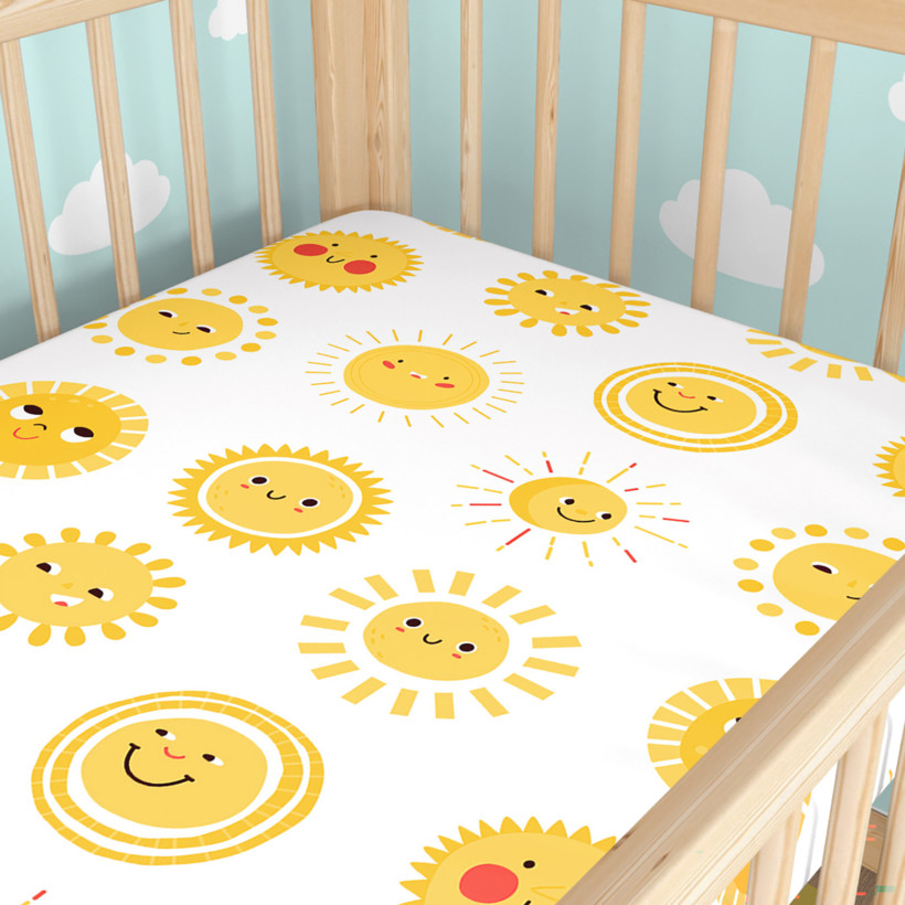 Katoenen hoeslaken voor het babybedje - Lachende zonnetjes