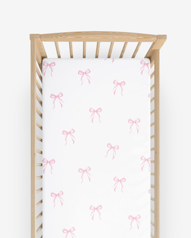 Katoenen hoeslaken voor het babybedje - Roze strikjes