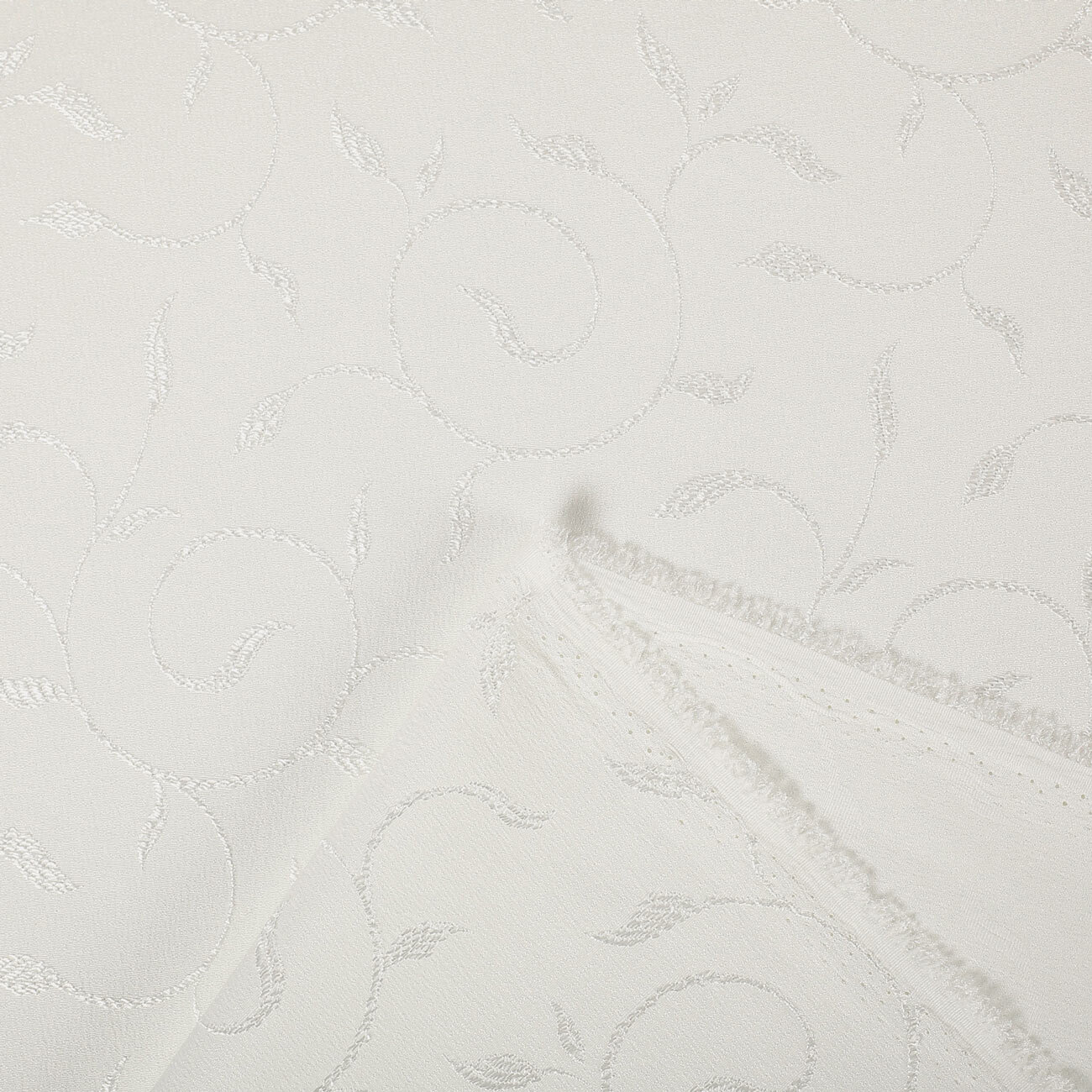 Tafelstof met tefloncoating - crème met grote ornamenten