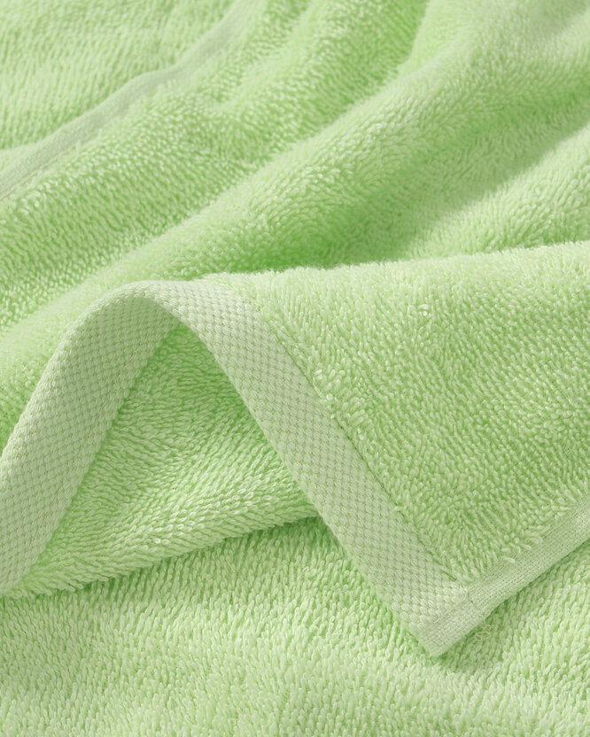 Kinder badstof handdoek - Egel met appeltje op groen