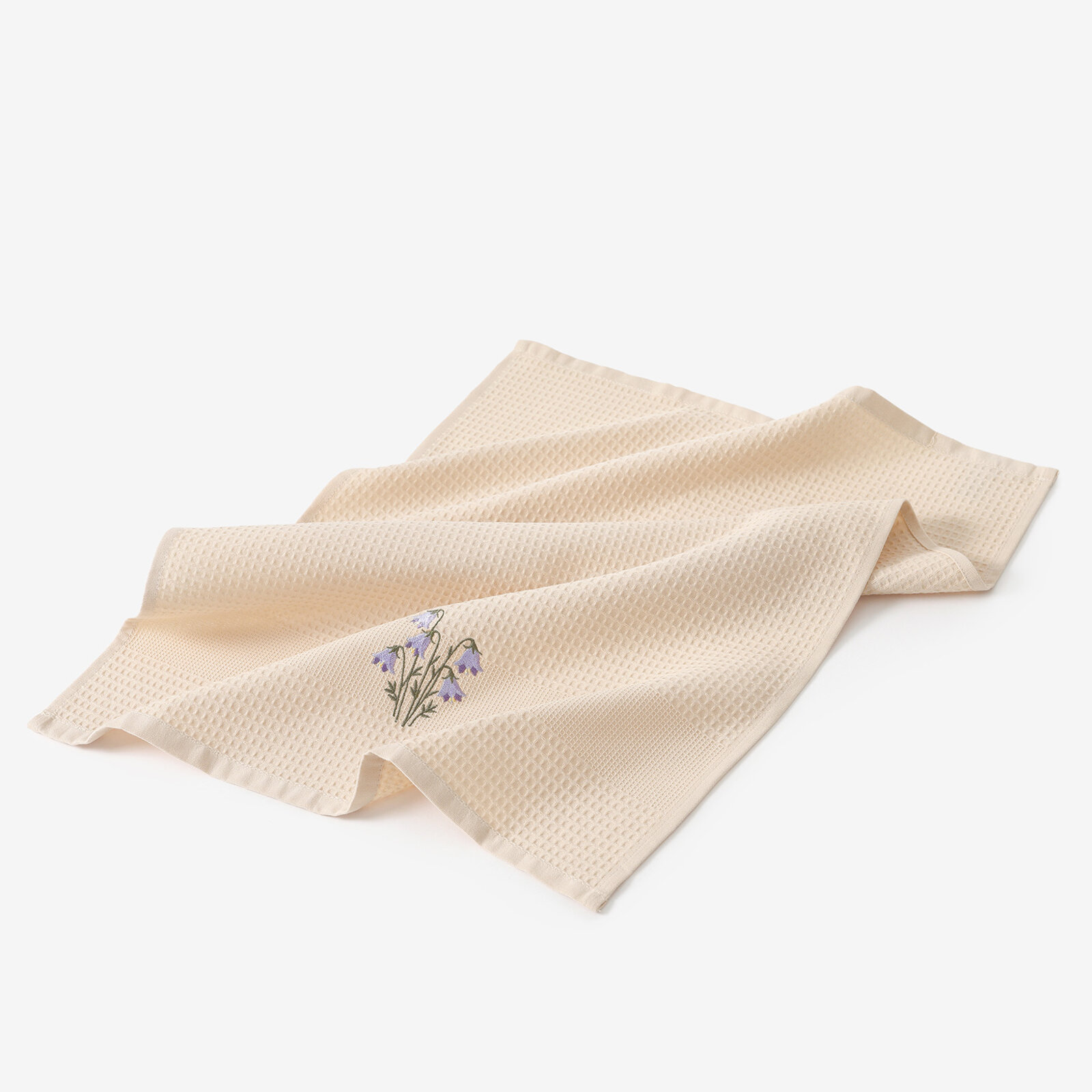 Geborduurde theedoek (wafeldoek) - Klokjes op beige