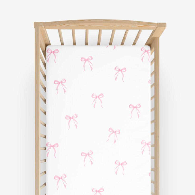 Katoenen hoeslaken voor het babybedje - Roze strikjes