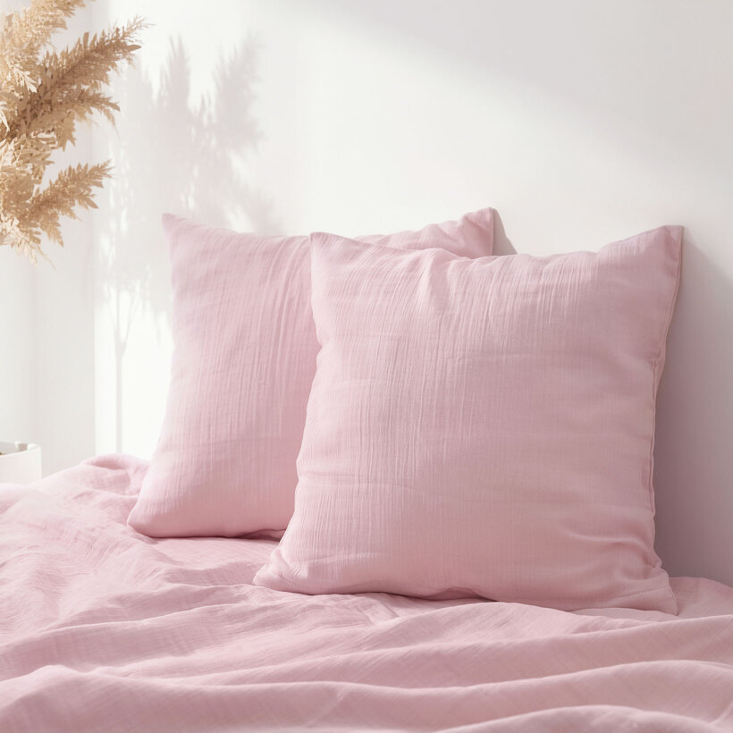 Mousseline kussensloop - pastelroze
