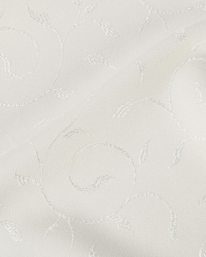 Tafelstof met tefloncoating - crème met grote ornamenten