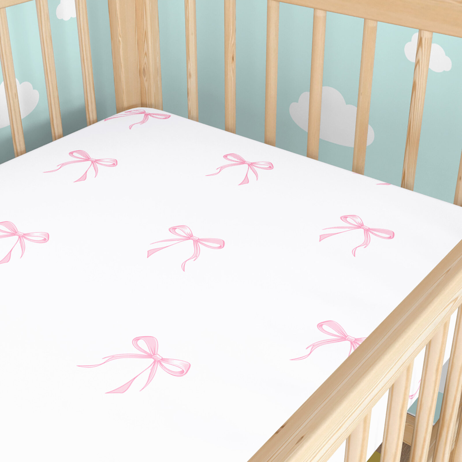 Katoenen hoeslaken voor het babybedje - Roze strikjes